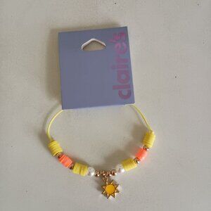 NWT Claire's dainty yellow and orange disc beads golden sun charm bracelet
